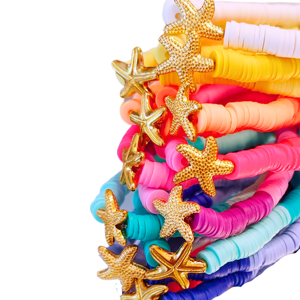 Bring the ocean to your accessory collection with our Preppy Starfish Bracelet. Adorned with a two tone colorful Heishi Clay beads, this summer bracelet is perfect for gifting or accessorizing your own look. Enjoy the bold bright ocean vibes and stretch fit of this bracelet, also perfect for stacking.