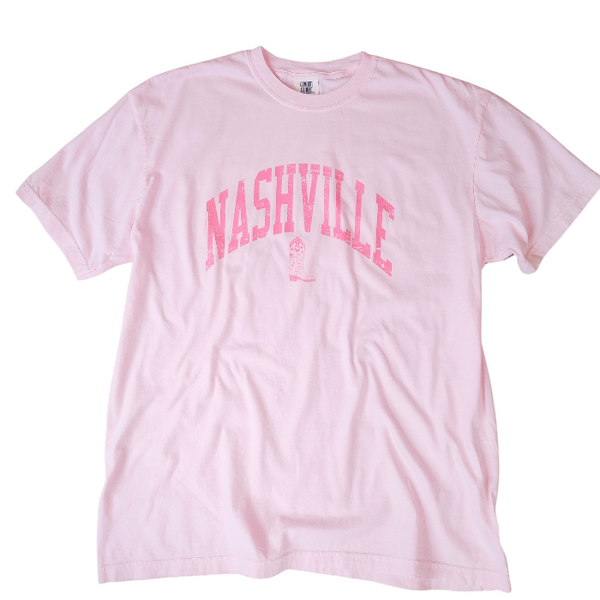 Step up your country style with our Nashville T-shirt! Made with Comfort Colors brand fabric, this cowgirl/cowboy boot themed shirt is perfect for any Nashville outfit. Pink, cute, trendy, and comfortable, size up for an oversized fit. Represent your country girl personality with this must-have graphic tee.