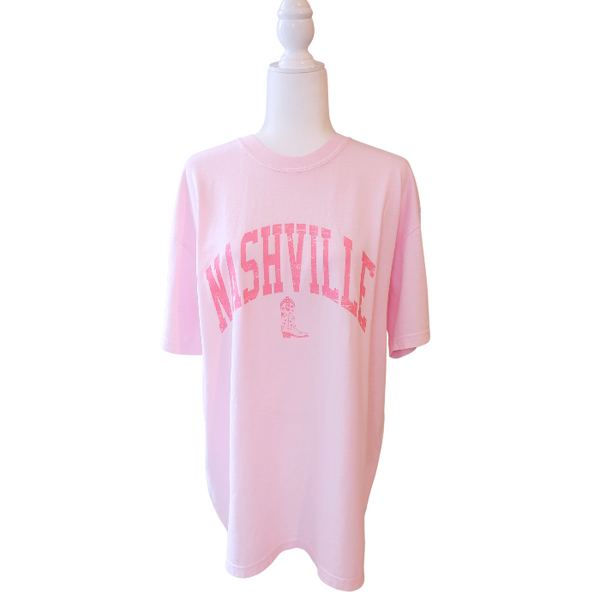 Step up your country style with our Nashville T-shirt! Made with Comfort Colors brand fabric, this cowgirl/cowboy boot themed shirt is perfect for any Nashville outfit. Pink, cute, trendy, and comfortable, size up for an oversized fit. Represent your country girl personality with this must-have graphic tee.
