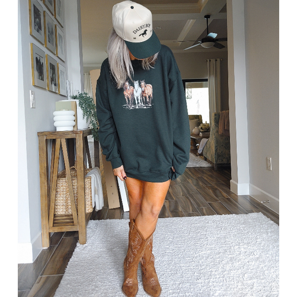Introducing our Horse Sweatshirt, the perfect gift for any horse lover! This 90s Vintage Western Style sweatshirt embodies the Boho Ranch Retro vibe with its trendy Equestrian Crewneck design. Size up for an oversized fit and stay cozy with this cute and retro cowgirl sweatshirt.