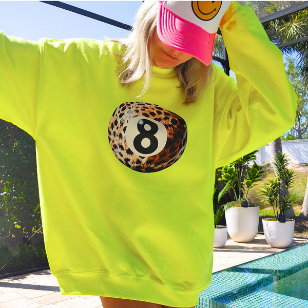 Take a stylish risk with our Neon Yellow Bold Leopard Animal Print 8 Ball Sweatshirt. This trendy crewneck is perfect for spring and summer and adds a fun pop of color to any outfit. Get ready to make a statement and stand out in this unique, aesthetic and preppy sweatshirt. This trendy crewneck is unisex and makes a great gift for anyone. Don't forget to size up for that extra oversized look!