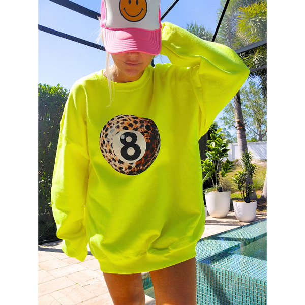Take a stylish risk with our Neon Yellow Bold Leopard Animal Print 8 Ball Sweatshirt. This trendy crewneck is perfect for spring and summer and adds a fun pop of color to any outfit. Get ready to make a statement and stand out in this unique, aesthetic and preppy sweatshirt. This trendy crewneck is unisex and makes a great gift for anyone. Don't forget to size up for that extra oversized look!