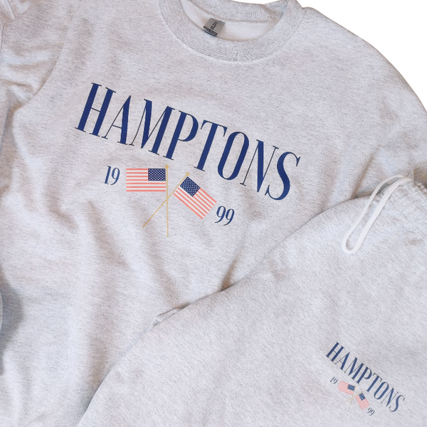 Introducing the Hamptons Sweatshirt and Sweatpants Set! These trendy and preppy set feature an American USA flag design, sweatpants have an oversized fit, an elastic waistband and cuff for added comfort, and a cozy loungewear feel. Perfect for your next beach vacation or for a stylish and comfortable look. Upgrade your wardrobe with this playful and comfortable set! (Sweatshirt size up for an even more oversized fit!)