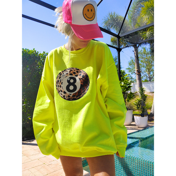 Take a stylish risk with our Neon Yellow Bold Leopard Animal Print 8 Ball Sweatshirt. This trendy crewneck is perfect for spring and summer and adds a fun pop of color to any outfit. Get ready to make a statement and stand out in this unique, aesthetic and preppy sweatshirt. This trendy crewneck is unisex and makes a great gift for anyone. Don't forget to size up for that extra oversized look!