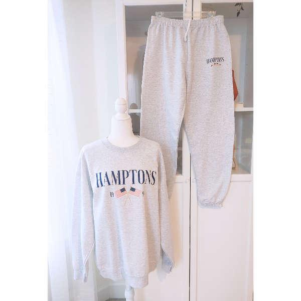 Introducing the Hamptons Sweatshirt and Sweatpants Set! These trendy and preppy set feature an American USA flag design, sweatpants have an oversized fit, an elastic waistband and cuff for added comfort, and a cozy loungewear feel. Perfect for your next beach vacation or for a stylish and comfortable look. Upgrade your wardrobe with this playful and comfortable set! (Sweatshirt size up for an even more oversized fit!)