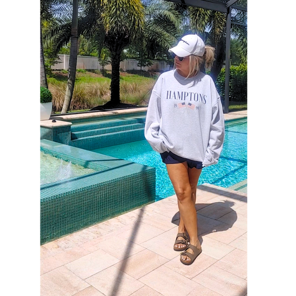Introducing the Hamptons Sweatshirt and Sweatpants Set! These trendy and preppy set feature an American USA flag design, sweatpants have an oversized fit, an elastic waistband and cuff for added comfort, and a cozy loungewear feel. Perfect for your next beach vacation or for a stylish and comfortable look. Upgrade your wardrobe with this playful and comfortable set! (Sweatshirt size up for an even more oversized fit!)