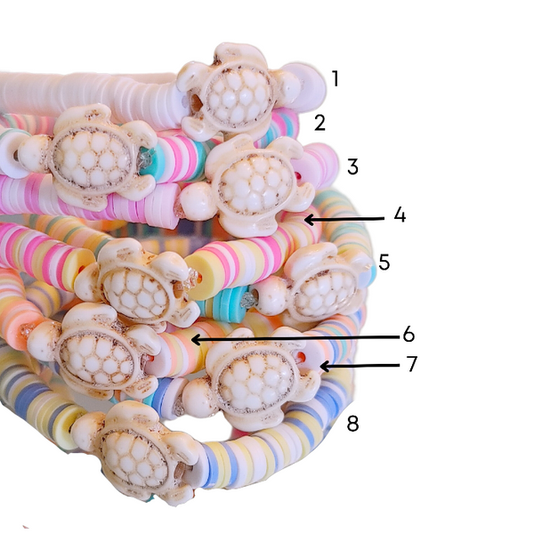 The Preppy Turtle Bracelet is perfect for summer! This eye-catching accessory features colorful Heishi clay beads and stone turtle bead to create an ocean-inspired look. It's perfect for stacking or gifting to someone special. With its unique design and mix of colors, this stretch bracelet is sure to stand out!