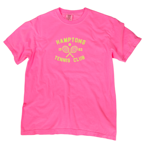 Serve up some serious style with the Hamptons Tennis Club T-Shirt! This preppy tee is the perfect way to add a pop of color to your to your summer wardrobe. Comfortable and stylish, it's perfect for the beach, pool or simply enjoying a warm day. But it's not just about style - this neon pink t-shirt, made by comfort colors is made with comfort in mind. Get ready to be the trendsetter this summer (and don't forget to size up for a trendy oversized fit!)