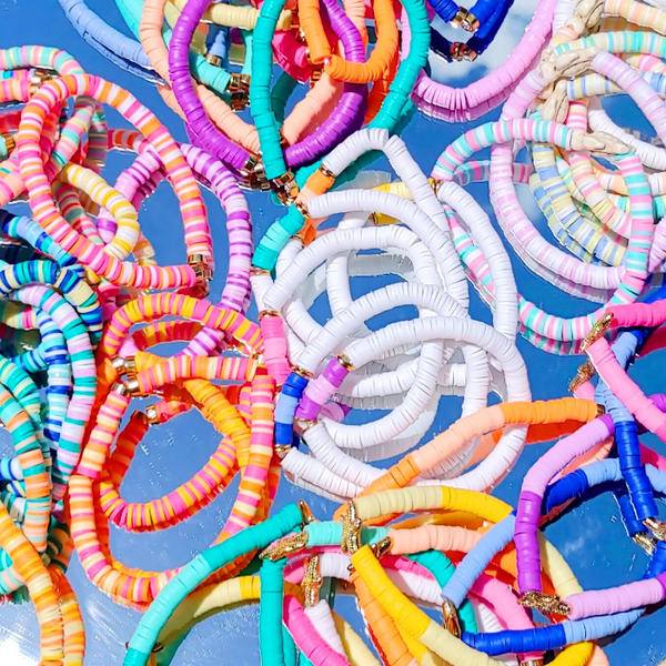 Our preppy, colorful, and bright mixed clay bracelets make the perfect summer (and beyond) accessory! With bright clay heishi beads, you can create unique stacking bracelets to match any outfit. The perfect gift idea for someone special!
