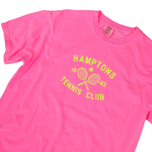 Serve up some serious style with the Hamptons Tennis Club T-Shirt! This preppy tee is the perfect way to add a pop of color to your to your summer wardrobe. Comfortable and stylish, it's perfect for the beach, pool or simply enjoying a warm day. But it's not just about style - this neon pink t-shirt, made by comfort colors is made with comfort in mind. Get ready to be the trendsetter this summer (and don't forget to size up for a trendy oversized fit!)