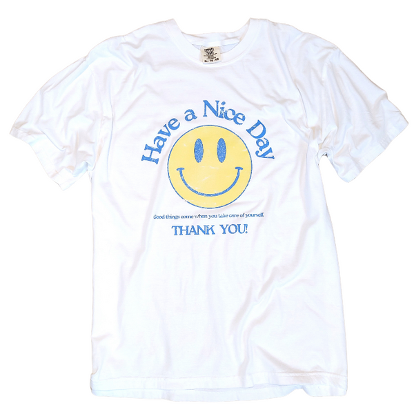 Spread positivity with our retro distressed vintage inspired smile face t-shirt. This 70s style shirt features a trendy, positive design and is available in both comfort color t-shirts and Gildan crewneck sweatshirts. Size up for an oversized, preppy aesthetic look. Perfect for those looking to make a statement and spread happy vibes. Thank us later!