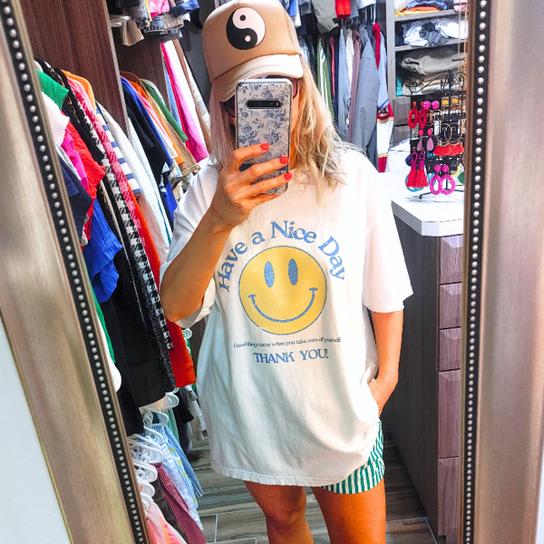 Spread positivity with our retro distressed vintage inspired smile face t-shirt. This 70s style shirt features a trendy, positive design and is available in both comfort color t-shirts and Gildan crewneck sweatshirts. Size up for an oversized, preppy aesthetic look. Perfect for those looking to make a statement and spread happy vibes. Thank us later!