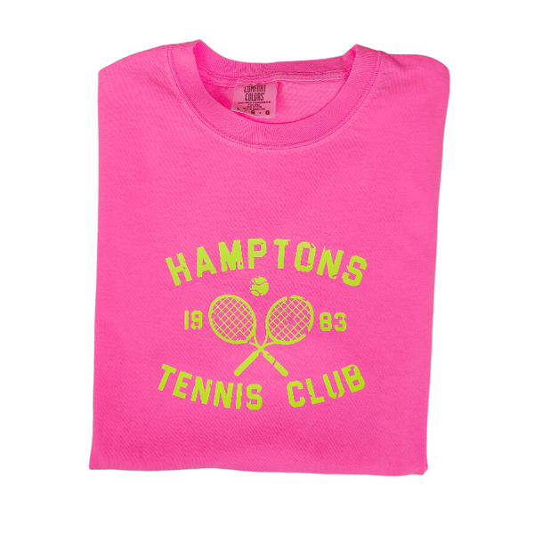 Serve up some serious style with the Hamptons Tennis Club T-Shirt! This preppy tee is the perfect way to add a pop of color to your to your summer wardrobe. Comfortable and stylish, it's perfect for the beach, pool or simply enjoying a warm day. But it's not just about style - this neon pink t-shirt, made by comfort colors is made with comfort in mind. Get ready to be the trendsetter this summer (and don't forget to size up for a trendy oversized fit!)