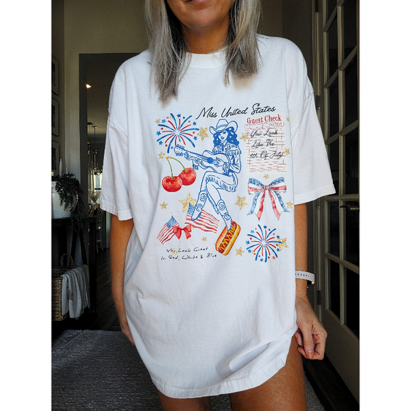 Get ready to celebrate in style with our 4th of July charms inspired cowgirl t-shirt! Made with 100% cotton from Comfort Colors, it's not only trendy but so comfortable. Featuring a playful tagline "You look like the fourth of July" and a coquette preppy bow design, this shirt is perfect for summer and all year around for showing off your patriotic pride. Don't forget to size up for an oversized look.