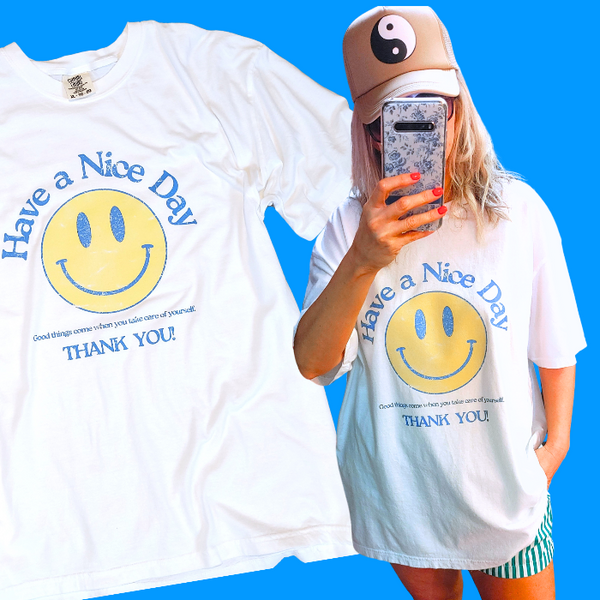 Spread positivity with our retro distressed vintage inspired smile face t-shirt. This 70s style shirt features a trendy, positive design and is available in both comfort color t-shirts and Gildan crewneck sweatshirts. Size up for an oversized, preppy aesthetic look. Perfect for those looking to make a statement and spread happy vibes. Thank us later!