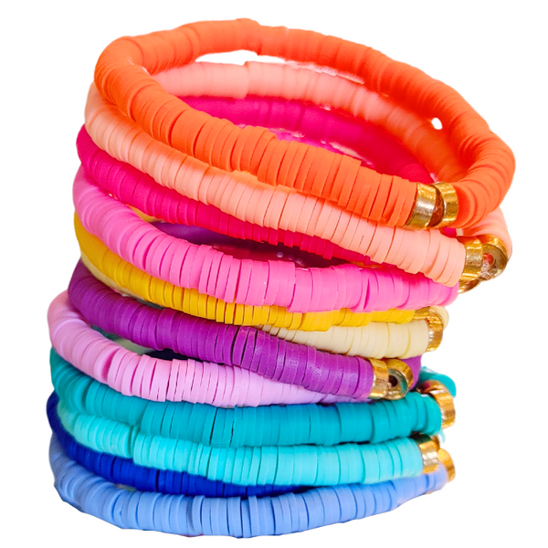 Brighten your summer look with these cheerful preppy bracelets! Crafted with colorful clay beads, they are perfect for stacking or wearing alone for a splash of fun. Great for accessorizing any outfit or as a gift idea - these beaded bracelets are sure to brighten up your day!