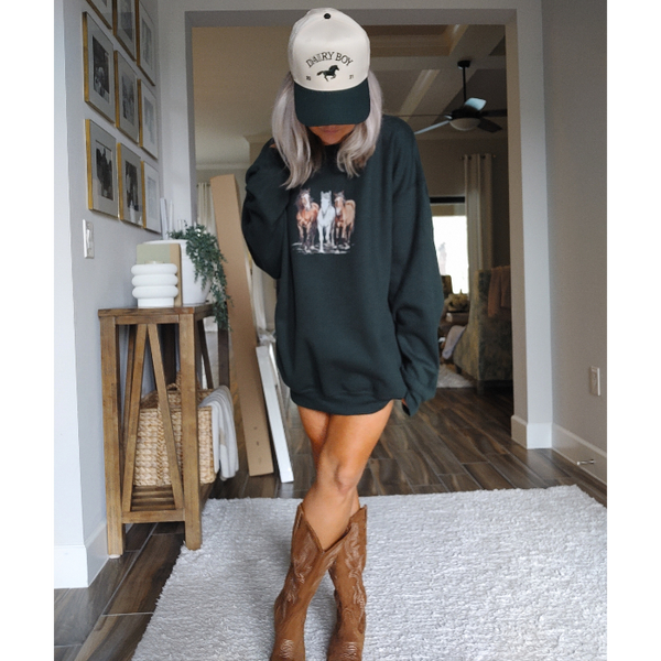 Introducing our Horse Sweatshirt, the perfect gift for any horse lover! This 90s Vintage Western Style sweatshirt embodies the Boho Ranch Retro vibe with its trendy Equestrian Crewneck design. Size up for an oversized fit and stay cozy with this cute and retro cowgirl sweatshirt.