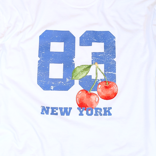 Introducing our 80's inspired Retro Sporty Shirt, featuring a vibrant Cherry graphic design and a nod to the iconic New York City. This trendy top is perfect for the preppy aesthetic and a must-have for any sports lover. Available in comfort color t-shirts and Gildan crewneck sweatshirts, size up for an oversized fit.