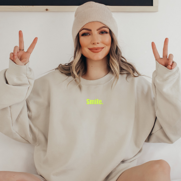 Neon Yellow Smiley Face Sweatshirt in the color Sand.
