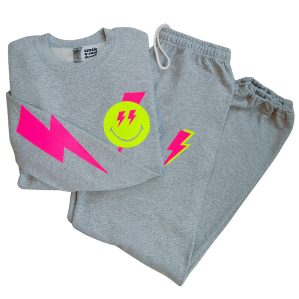 smiley face neon pink lightning bolt crewneck sweatsuit set