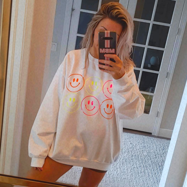 neon smiley face sweatshirt