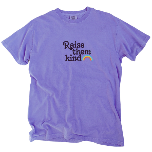 Distressed Raise Them Kind Rainbow Graphic T-Shirt.