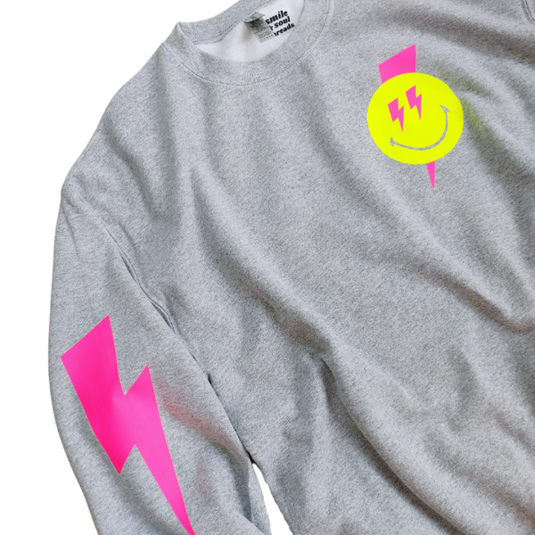 Smiley Face Lightning Bolt Crewneck Sweatshirt.