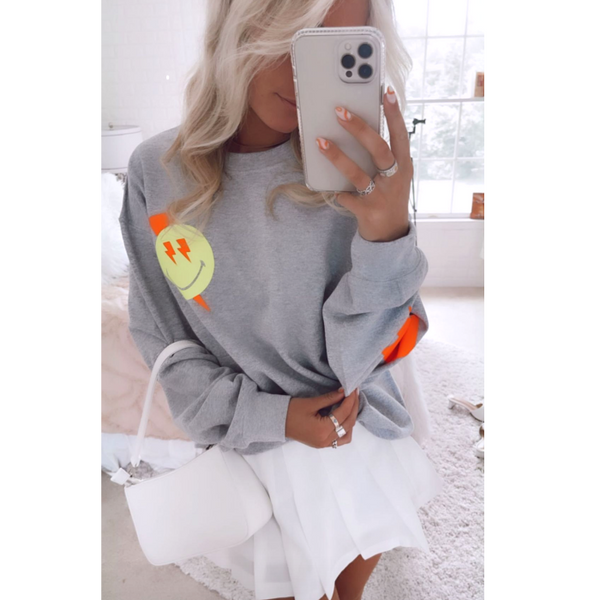 Smiley Face Lightning Bolt Crewneck Sweatshirt.