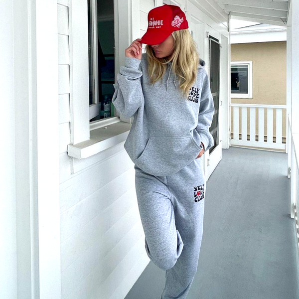 self love club smiley heart sweatpants