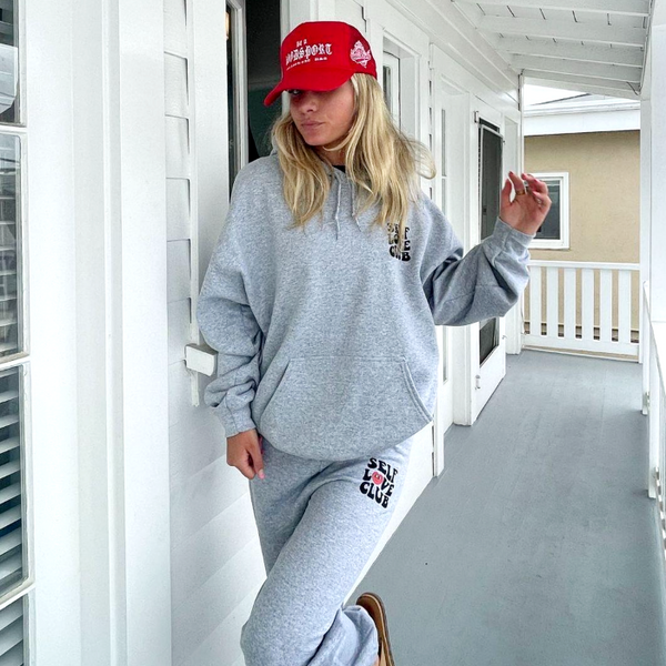 self love club smiley heart sweatpants