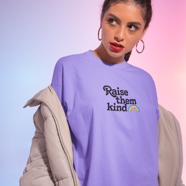 Distressed Raise Them Kind Rainbow Graphic T-Shirt.
