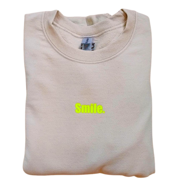 Neon Yellow Smiley Face Sweatshirt in the color Sand.