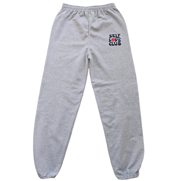 self love club smiley heart sweatpants