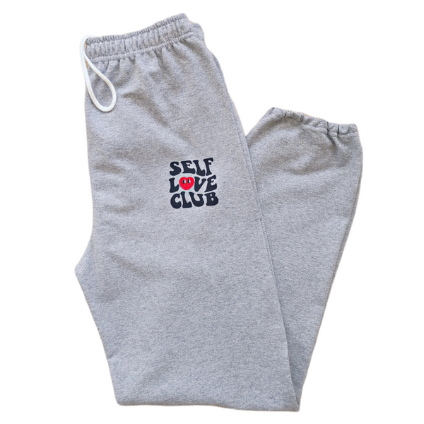 self love club smiley heart sweatpants