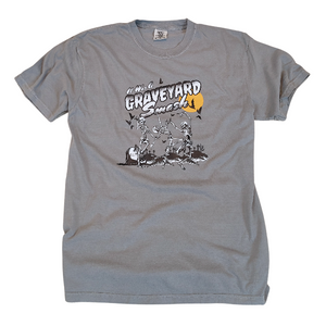 This Halloween, make a statement with our Halloween graveyard smash dancing skeleton t-shirt! Featuring a retro skeleton design, this shirt is perfect for the spooky season and will add a touch of vintage style to your fall wardrobe. Available in both comfort color t-shirts and Gildan crewneck sweatshirts, size up for an oversized fit. Get yours today!