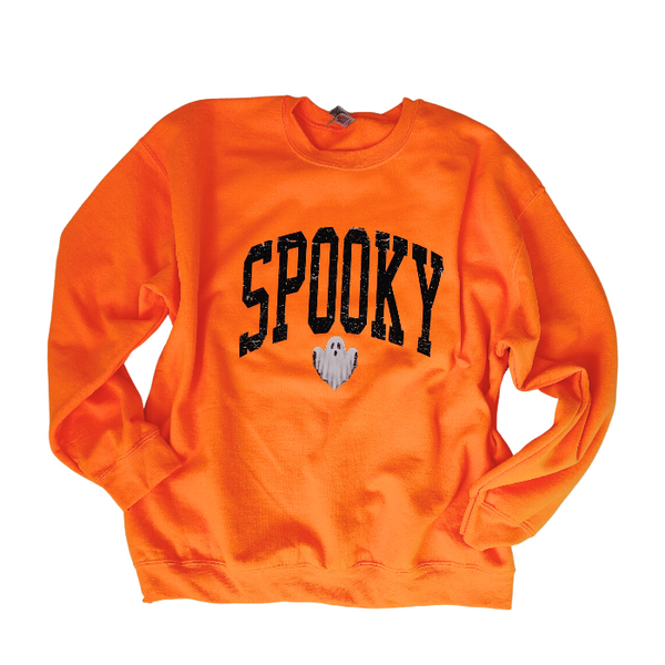 Unleash your spooky style with our Spooky Ghost Sweatshirt! Featuring a cute ghost with the word SPOOKY in varsity lettering and a distressed design, this sweatshirt is perfect for Halloween parties and the entire spooky season. Size up for an oversized fit. Get yours today and join the ghost squad!