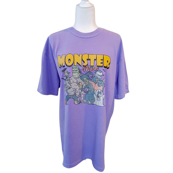 Get in the Halloween spirit with our Retro Halloween Shirt! This Monster Mash shirt features a unique distressed vintage design on a comfortable Comfort Colors tee. With a spooky and fun design, it's the perfect shirt for all your Halloween festivities. Available in both comfort color t-shirts and Gildan crewneck sweatshirts, you can't go wrong with this Monster Tee. Size up for an oversized fit!