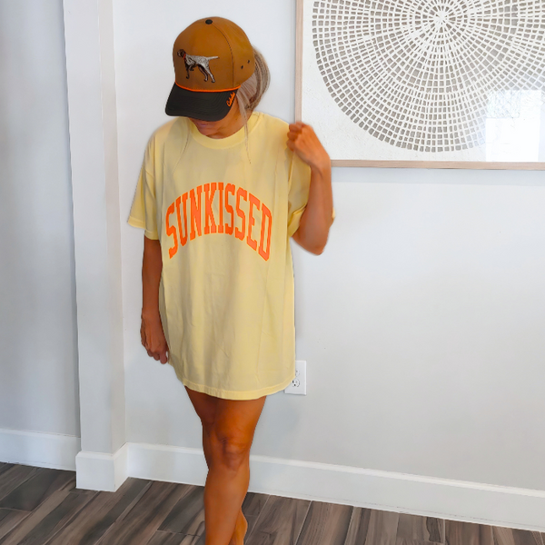 This neon Sunkissed shirt is the perfect summer tee. Comfortable and stylish, it's perfect for the beach, pool or simply enjoying a warm day. Brighten up your wardrobe in this trendy soft bright neon t-shirt you'll want to wear all year round! This is your ultimate summer t-shirt.