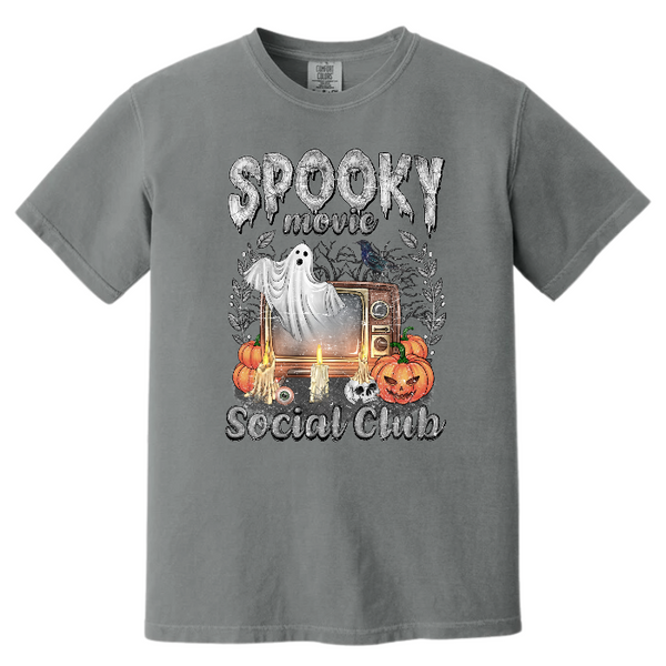 Conquer your fears with our Spooky Movie Social Club T-shirt! Show your love for horror movies and celebrate Halloween in style with our retro, vintage design. Available in comfort color t-shirts and Gildan crewneck sweatshirts, you can size up for an oversized fit. Be bold, be daring, be spooky! Order now!