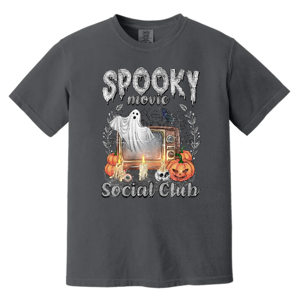 Conquer your fears with our Spooky Movie Social Club T-shirt! Show your love for horror movies and celebrate Halloween in style with our retro, vintage design. Available in comfort color t-shirts and Gildan crewneck sweatshirts, you can size up for an oversized fit. Be bold, be daring, be spooky! Order now!