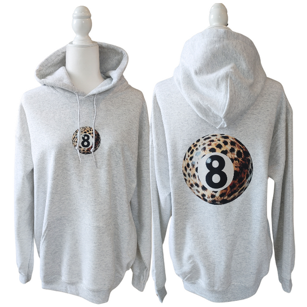 Stay stylish and on-trend with our 8 Ball Hoodie. Stand out from the crowd with a unique leopard print eight ball design that brings a touch of y2k fashion to your wardrobe. This preppy hoodie features a lucky symbol, perfect for bringing good luck to your day. For an oversized fit size up for a comfortable and streetwear-inspired look.