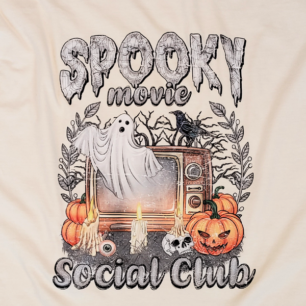 Conquer your fears with our Spooky Movie Social Club T-shirt! Show your love for horror movies and celebrate Halloween in style with our retro, vintage design. Available in comfort color t-shirts and Gildan crewneck sweatshirts, you can size up for an oversized fit. Be bold, be daring, be spooky! Order now!