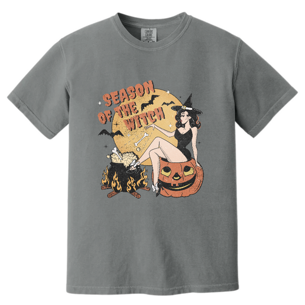 Get into the spooky spirit with our Season of the Witch Shirt. The distressed vintage Halloween design adds retro charm to this cute and funny shirt. With witchy vibes and a variety of options, including comfort color t-shirts and Gildan crewneck sweatshirts, you'll be ready for Halloween in style. (Size up for an oversized fit!)