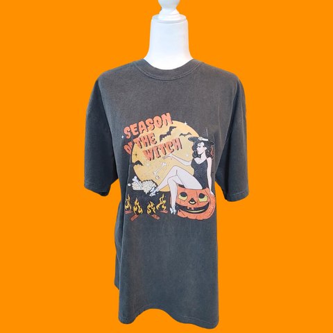 Get into the spooky spirit with our Season of the Witch Shirt. The distressed vintage Halloween design adds retro charm to this cute and funny shirt. With witchy vibes and a variety of options, including comfort color t-shirts and Gildan crewneck sweatshirts, you'll be ready for Halloween in style. (Size up for an oversized fit!)