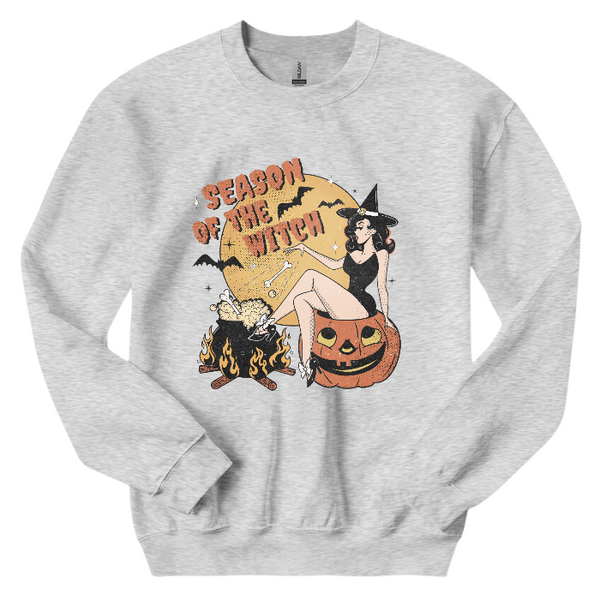 Get into the spooky spirit with our Season of the Witch Shirt. The distressed vintage Halloween design adds retro charm to this cute and funny shirt. With witchy vibes and a variety of options, including comfort color t-shirts and Gildan crewneck sweatshirts, you'll be ready for Halloween in style. (Size up for an oversized fit!)