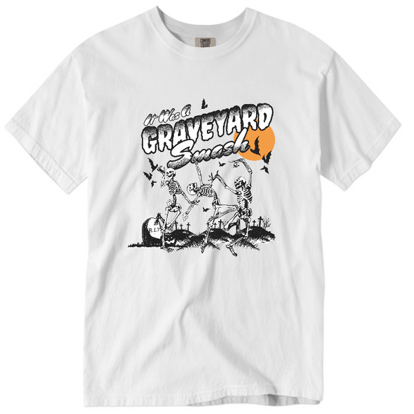 This Halloween, make a statement with our Halloween graveyard smash dancing skeleton t-shirt! Featuring a retro skeleton design, this shirt is perfect for the spooky season and will add a touch of vintage style to your fall wardrobe. Available in both comfort color t-shirts and Gildan crewneck sweatshirts, size up for an oversized fit. Get yours today!