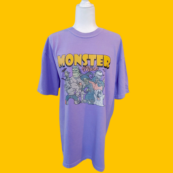 Get in the Halloween spirit with our Retro Halloween Shirt! This Monster Mash shirt features a unique distressed vintage design on a comfortable Comfort Colors tee. With a spooky and fun design, it's the perfect shirt for all your Halloween festivities. Available in both comfort color t-shirts and Gildan crewneck sweatshirts, you can't go wrong with this Monster Tee. Size up for an oversized fit!