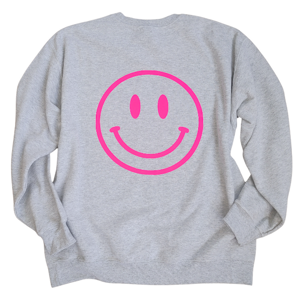 Bring all the good vibes with this cozy “Happy Is the New Rich” smiley face sweatshirt. Featuring a bold neon-pink front chest quote and an oversized happy face graphic on the back, this crewneck is designed to make every outfit feel a little brighter. This soft, comfy unisex crewneck makes the perfect gift and for everyday wear, this is your new go-to layer for errands, lounging, weekend adventures, and everything in between. Pair it with our matching sweatpants (sold separately) for the full set. 