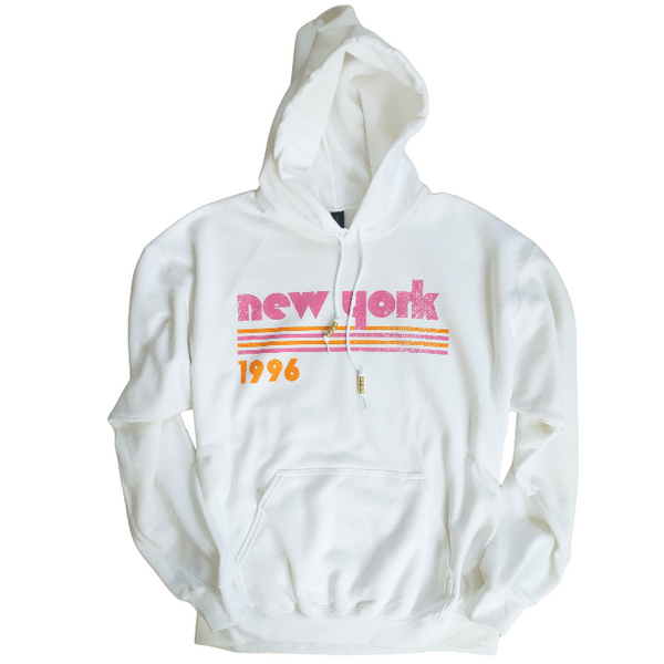 This New York Hoodie is the perfect blend of retro style and everyday comfort. Featuring a distressed New York graphic with vibrant pink and orange stripes, metallic gold beaded drawstrings, and a cozy unisex fit, it's a statement hoodie made for city lovers, travelers, and anyone who loves a bold vintage-inspired aesthetic. Size up 1–2 sizes for a cozy oversized look.