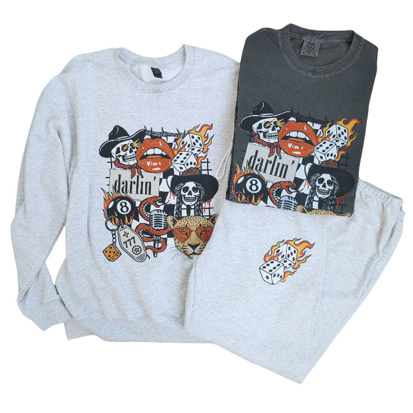 Bring bold Western tattoo vibes to your wardrobe with this retro graphic sweatshirt featuring cowboy skulls, lucky dice, flames, and a heart-eyed leopard. This cozy crewneck is made with 50% cotton / 50% polyester, perfect for everyday wear and all-season layering. 